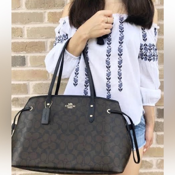 Coach Handbags - Coach carryall drawstring bag  good condition